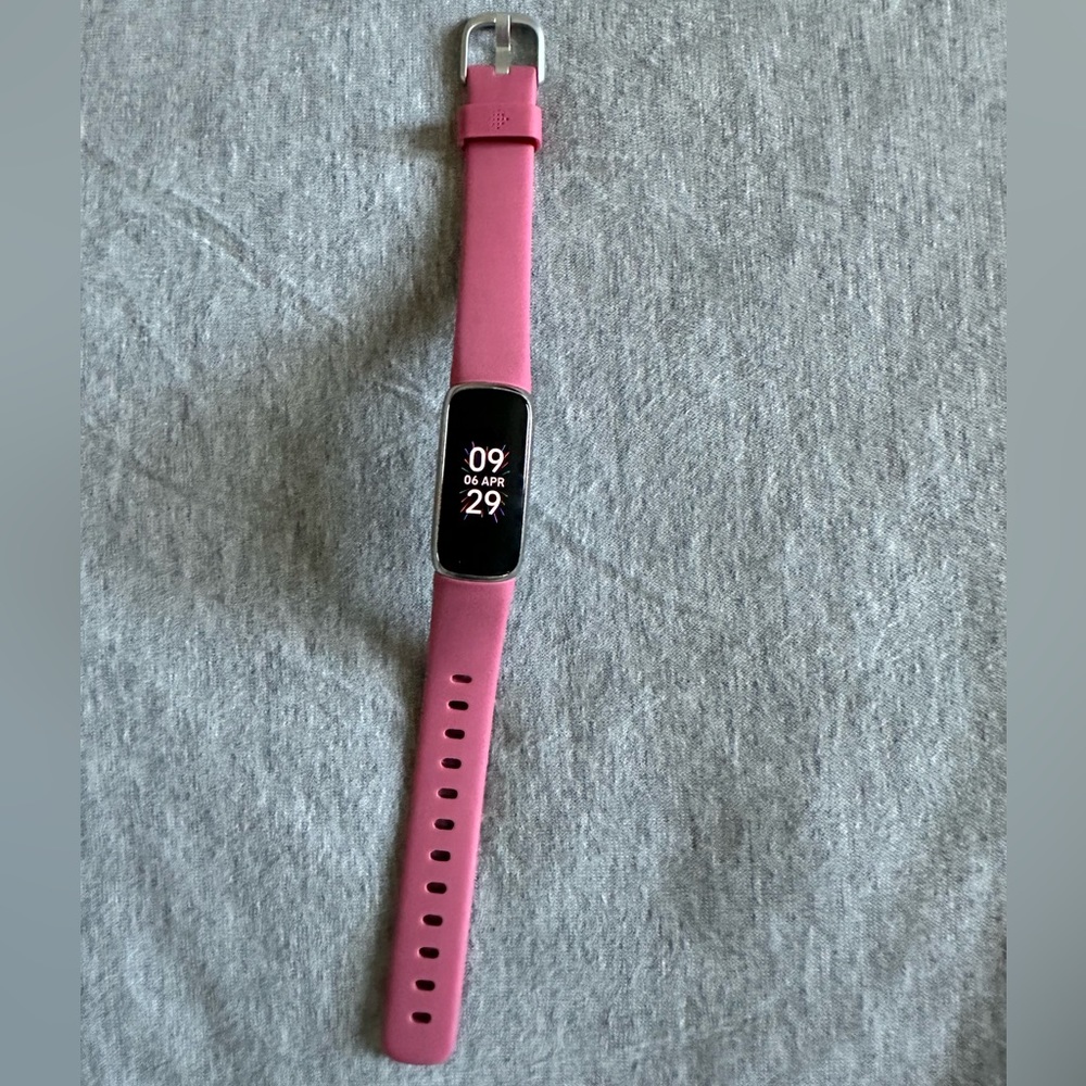 Fitbit luxe, stainless steel with small orchid pink band fitness tracker